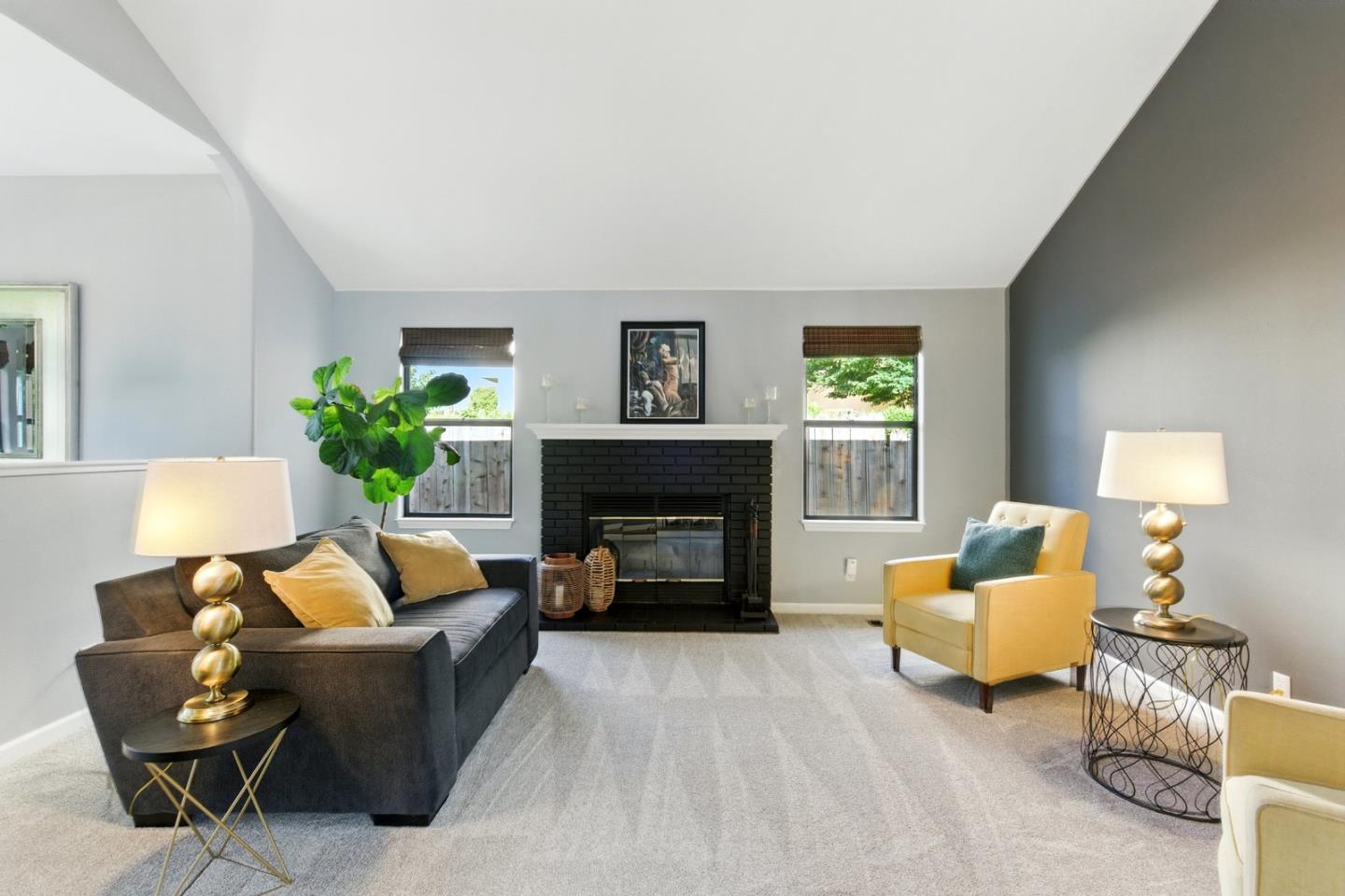 735 Georgetown Place Gilroy, CA 95020 - Photo 13 of 48 a living room with furniture and a fireplace