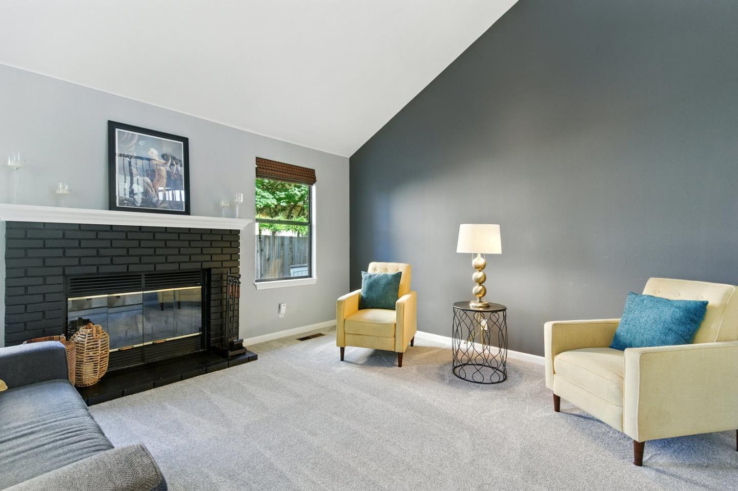 735 Georgetown Place Gilroy, CA 95020 - Photo 14 of 48 a living room with furniture and a fireplace