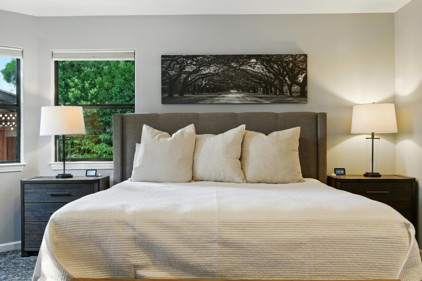 735 Georgetown Place Gilroy, CA 95020 - Photo 19 of 48 a large bed sitting in a bedroom next to a window