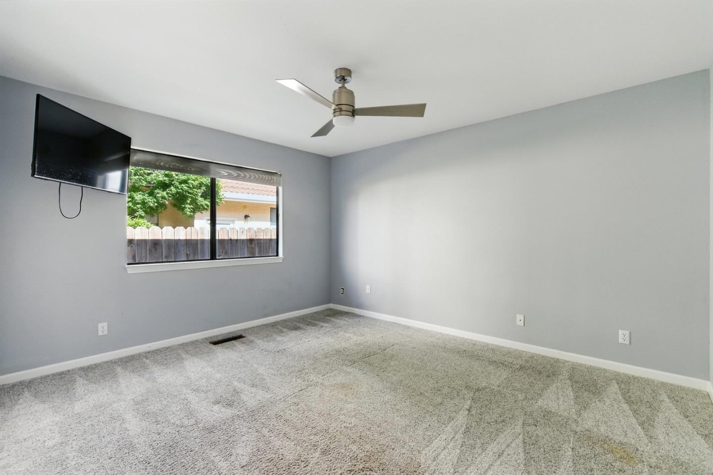 735 Georgetown Place Gilroy, CA 95020 - Photo 26 of 48 a view of an empty room with a window