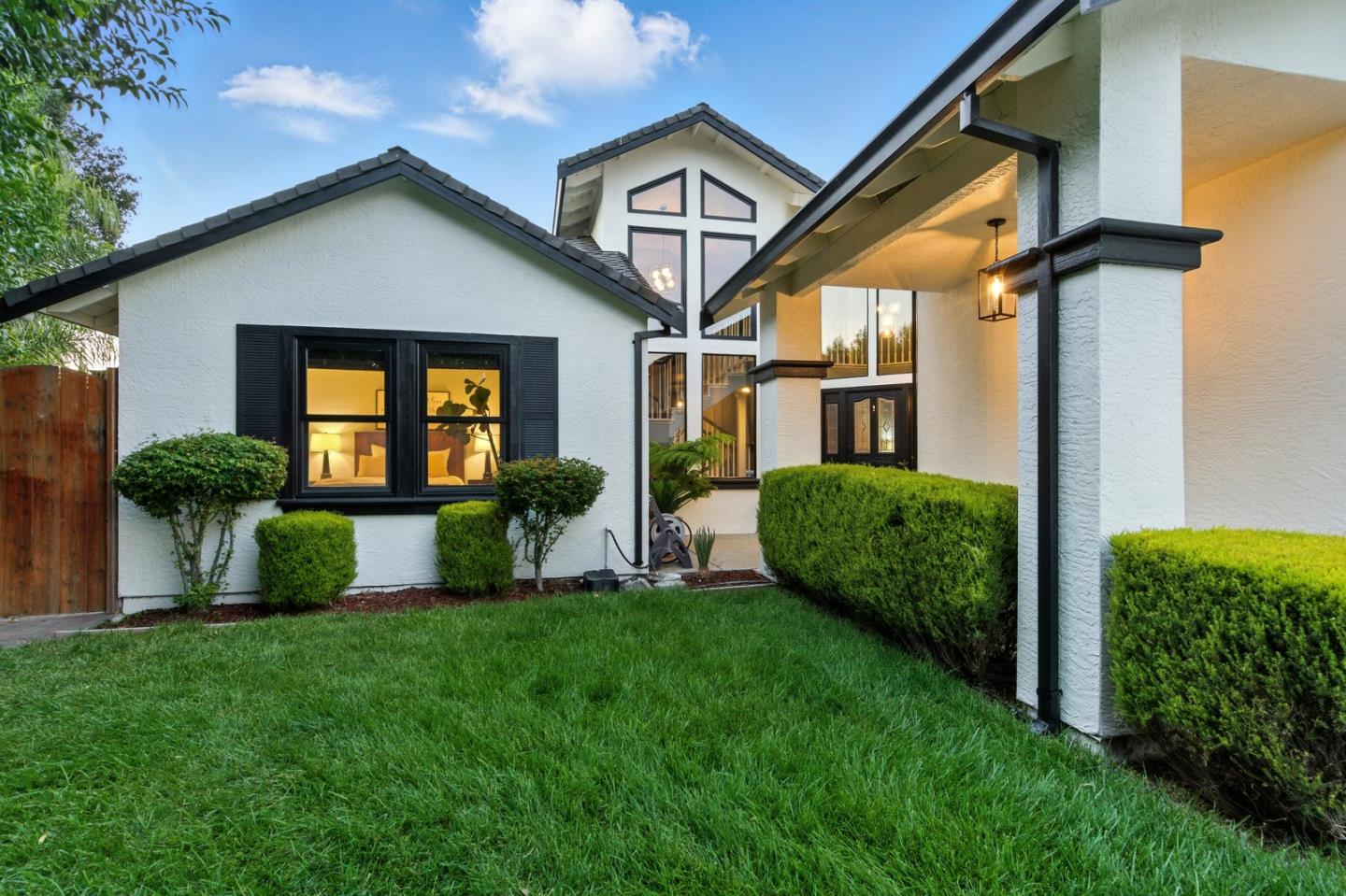 735 Georgetown Place Gilroy, CA 95020 - Photo 3 of 48 a view of a house with a yard and potted plants
