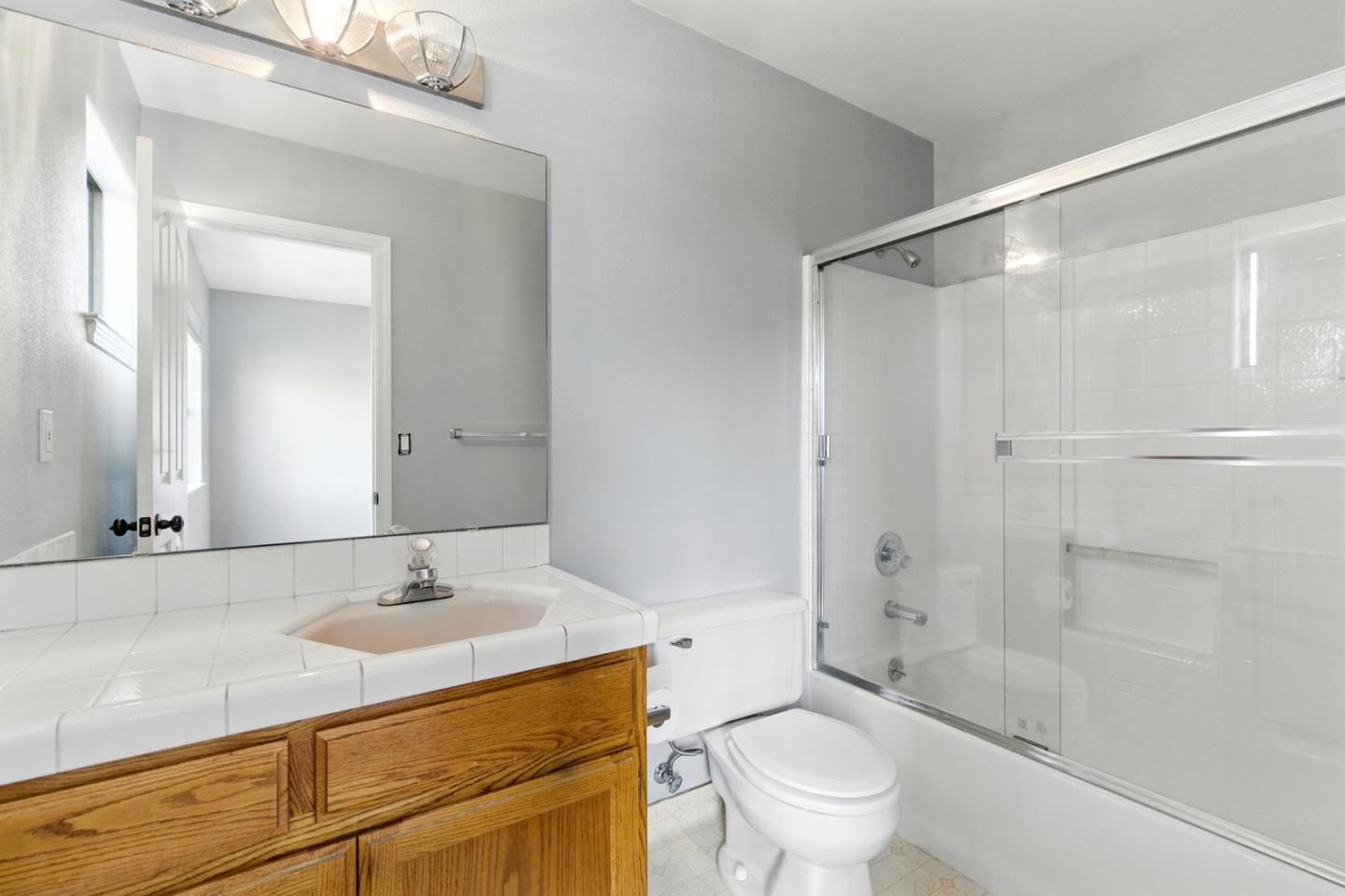 735 Georgetown Place Gilroy, CA 95020 - Photo 31 of 48 a bathroom with a sink toilet and shower