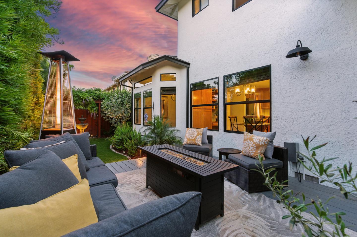 735 Georgetown Place Gilroy, CA 95020 - Photo 34 of 48 a view of a patio with couches table and chairs and potted plants