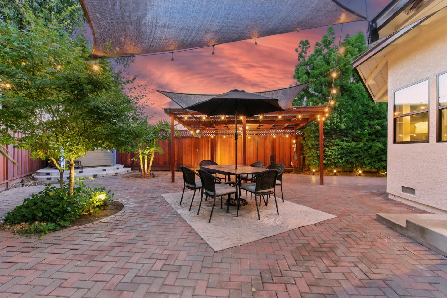 735 Georgetown Place Gilroy, CA 95020 - Photo 37 of 48 a patio with table and chairs