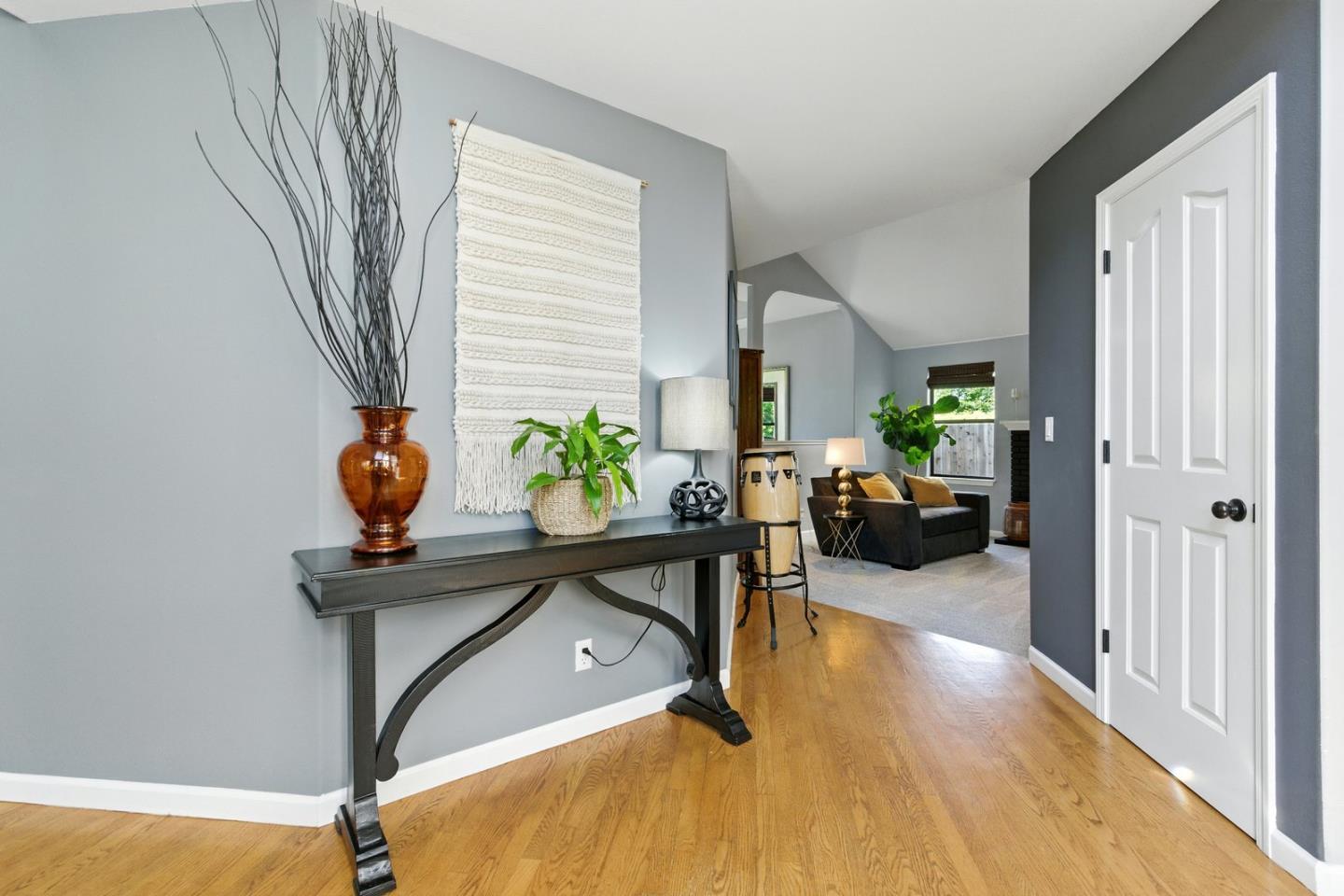 735 Georgetown Place Gilroy, CA 95020 - Photo 6 of 48 a living room with furniture and a potted plant