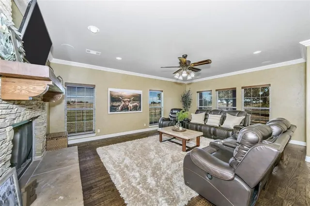 a large kitchen with a table and chairs