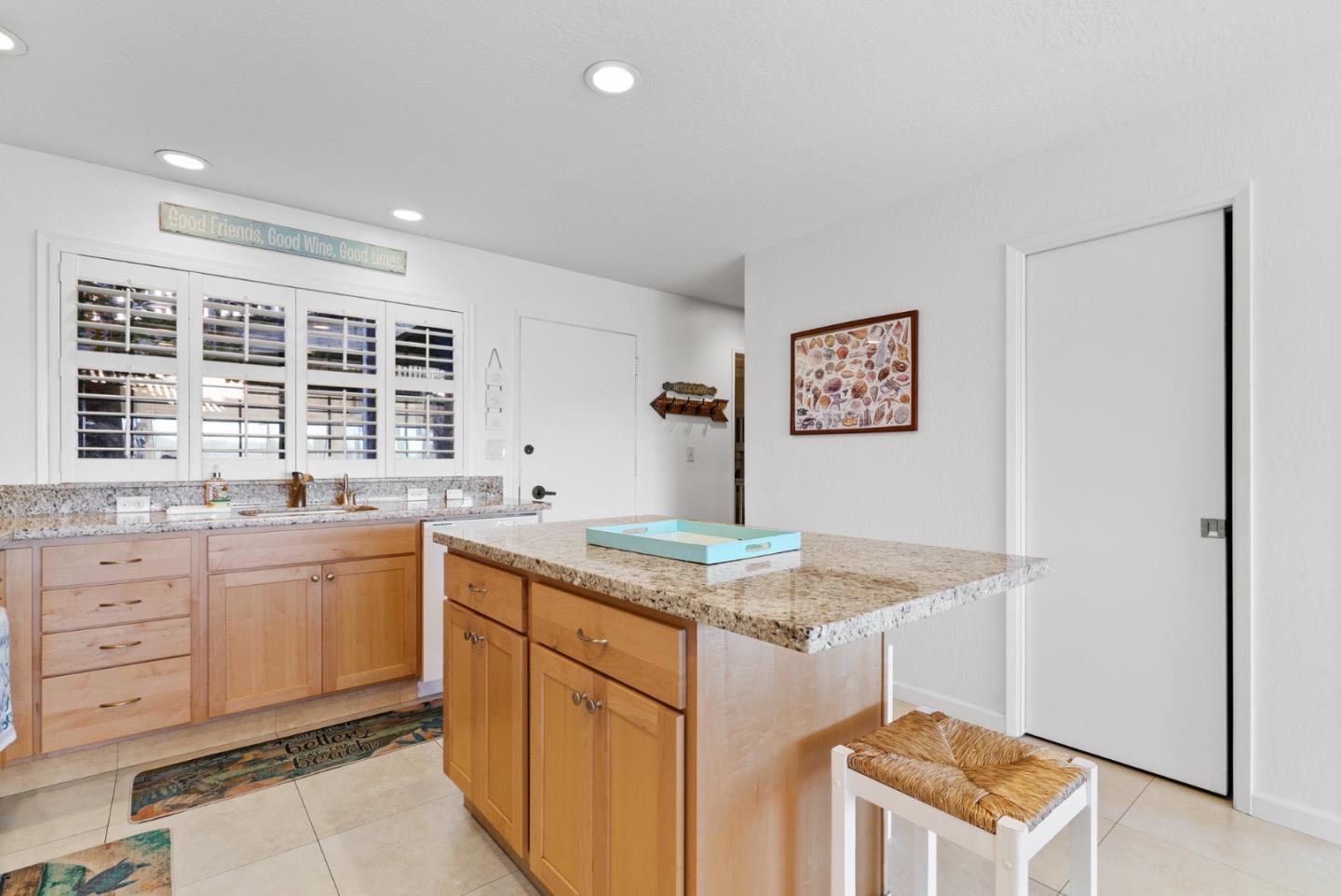 101 Shell Road, Unit 208 Watsonville, CA 95076 - Photo 17 of 30 a kitchen with a stove a sink and a refrigerator