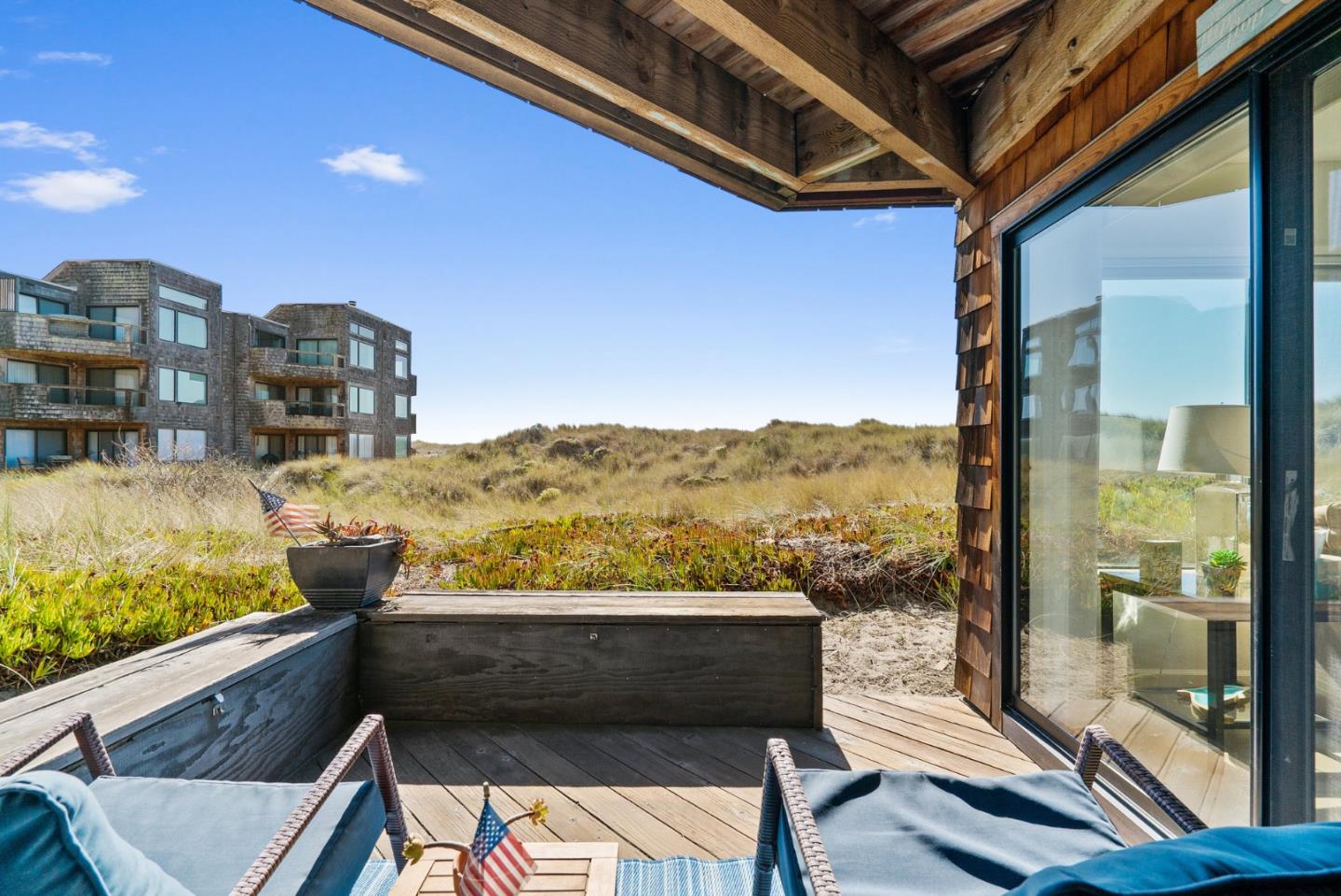 101 Shell Road, Unit 208 Watsonville, CA 95076 - Photo 6 of 30 a view of a balcony with two chairs and a table
