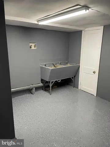 a view of a room with table and chair