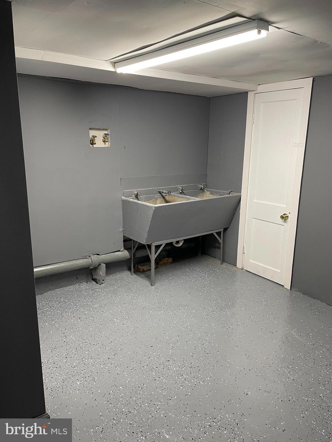 3211 Chesterfield Avenue Baltimore, MD 21213 - Photo 22 of 26 a view of a room with table and chair