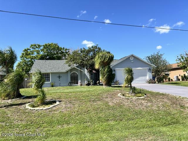 739 Raleigh Road Southeast Palm Bay, FL 32909 - Photo 2 of 24 739 House Front 4
