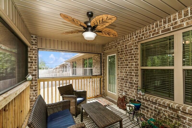 5739 Marigold Loop Crestview, FL 32539 - Photo 11 of 36 a balcony view with a sitting space