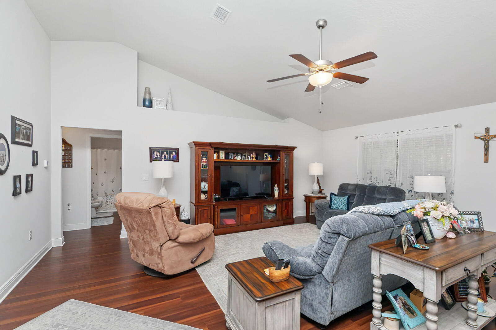5739 Marigold Loop Crestview, FL 32539 - Photo 16 of 36 a living room with furniture and a flat screen tv
