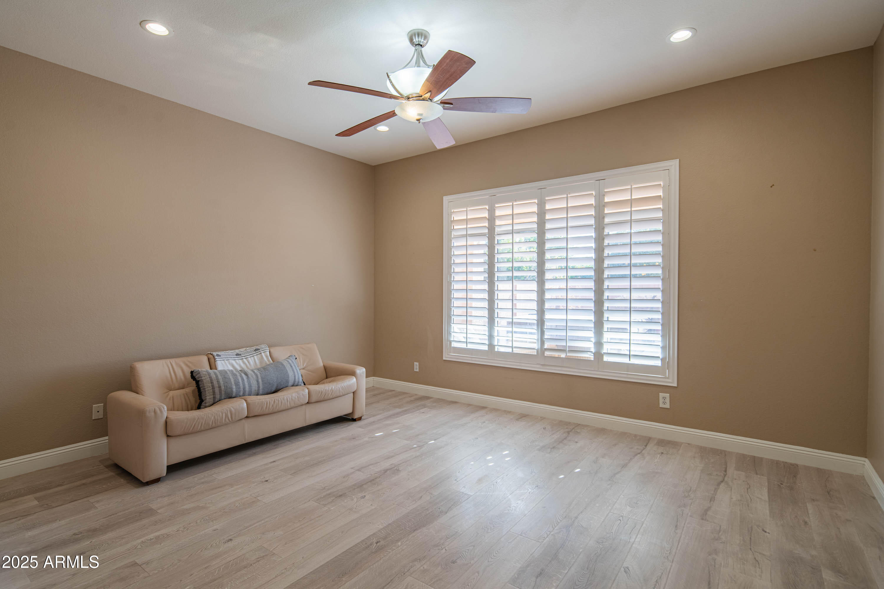 6811 West Del Rio Street, Unit 2 Chandler, AZ 85226 - Photo 23 of 49 a living room with furniture and a large window