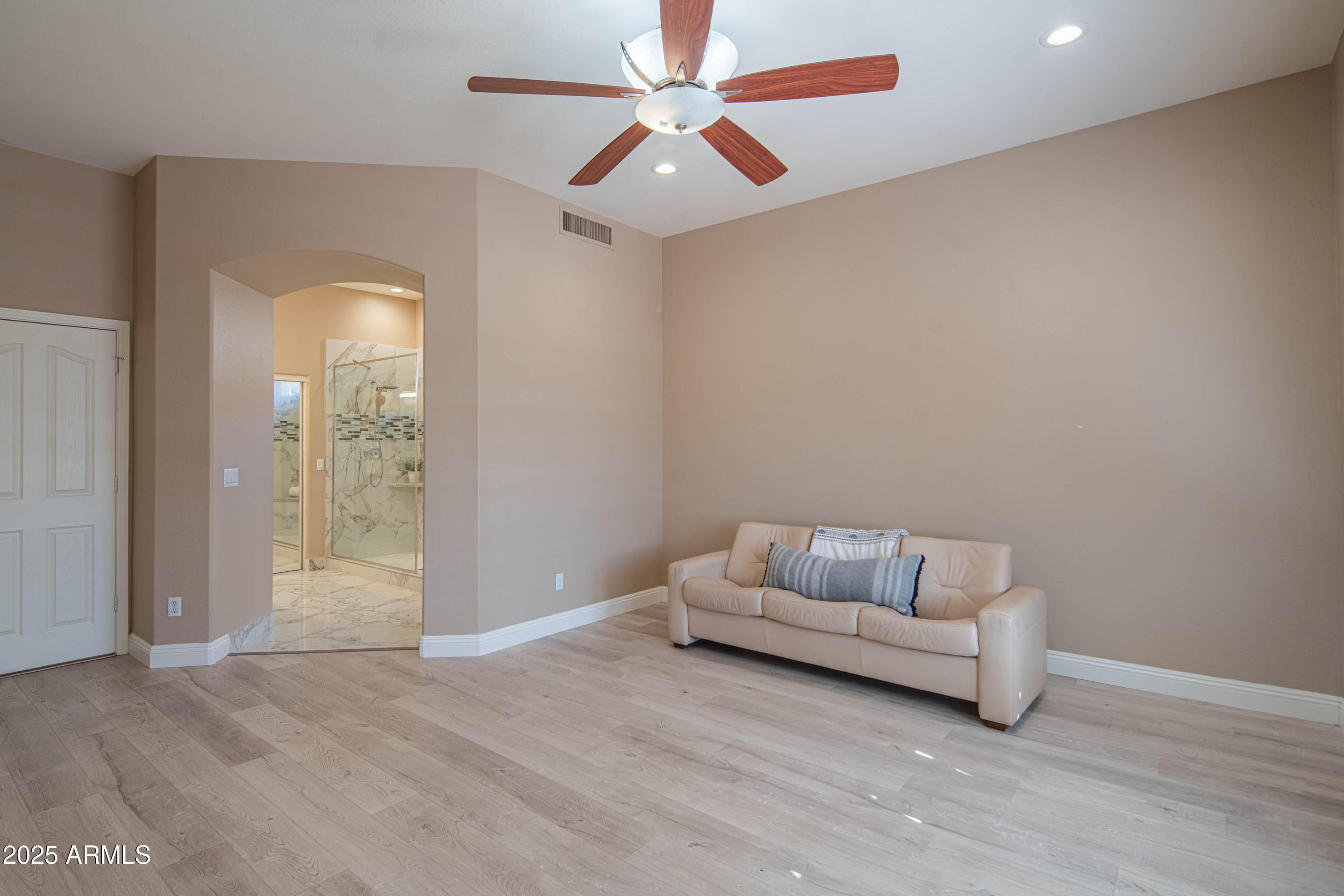 6811 West Del Rio Street, Unit 2 Chandler, AZ 85226 - Photo 24 of 49 a living room with furniture and a ceiling fan