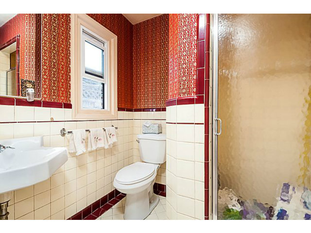 39 De Sabla Road San Mateo, CA 94402 - Photo 14 of 25 a bathroom with a toilet sink and mirror