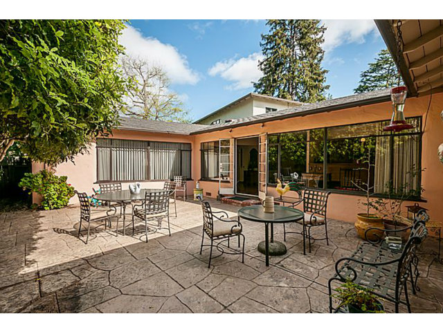 39 De Sabla Road San Mateo, CA 94402 - Photo 15 of 25 a view of a patio with table and chairs and potted plants