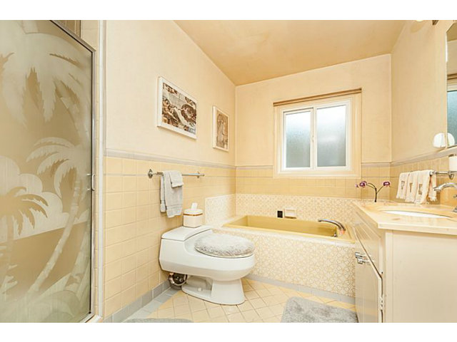 39 De Sabla Road San Mateo, CA 94402 - Photo 20 of 25 a bathroom with a sink a toilet and shower