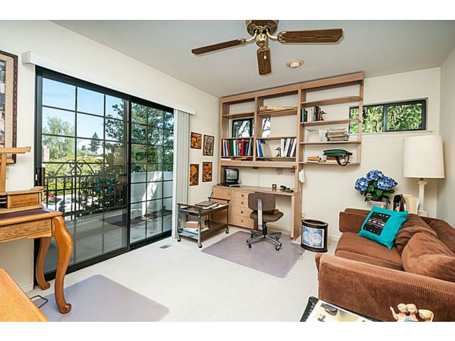 39 De Sabla Road San Mateo, CA 94402 - Photo 21 of 25 a living room with furniture and a floor to ceiling window