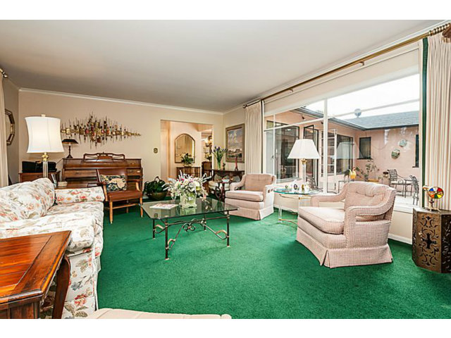 39 De Sabla Road San Mateo, CA 94402 - Photo 4 of 25 a living room with furniture and a large window
