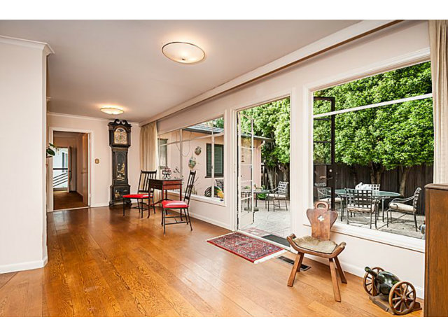 39 De Sabla Road San Mateo, CA 94402 - Photo 6 of 25 a living room with furniture and a large window
