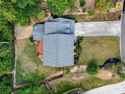 an aerial view of residential house with outdoor space