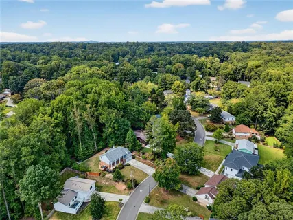 an aerial view of residential house with outdoor space