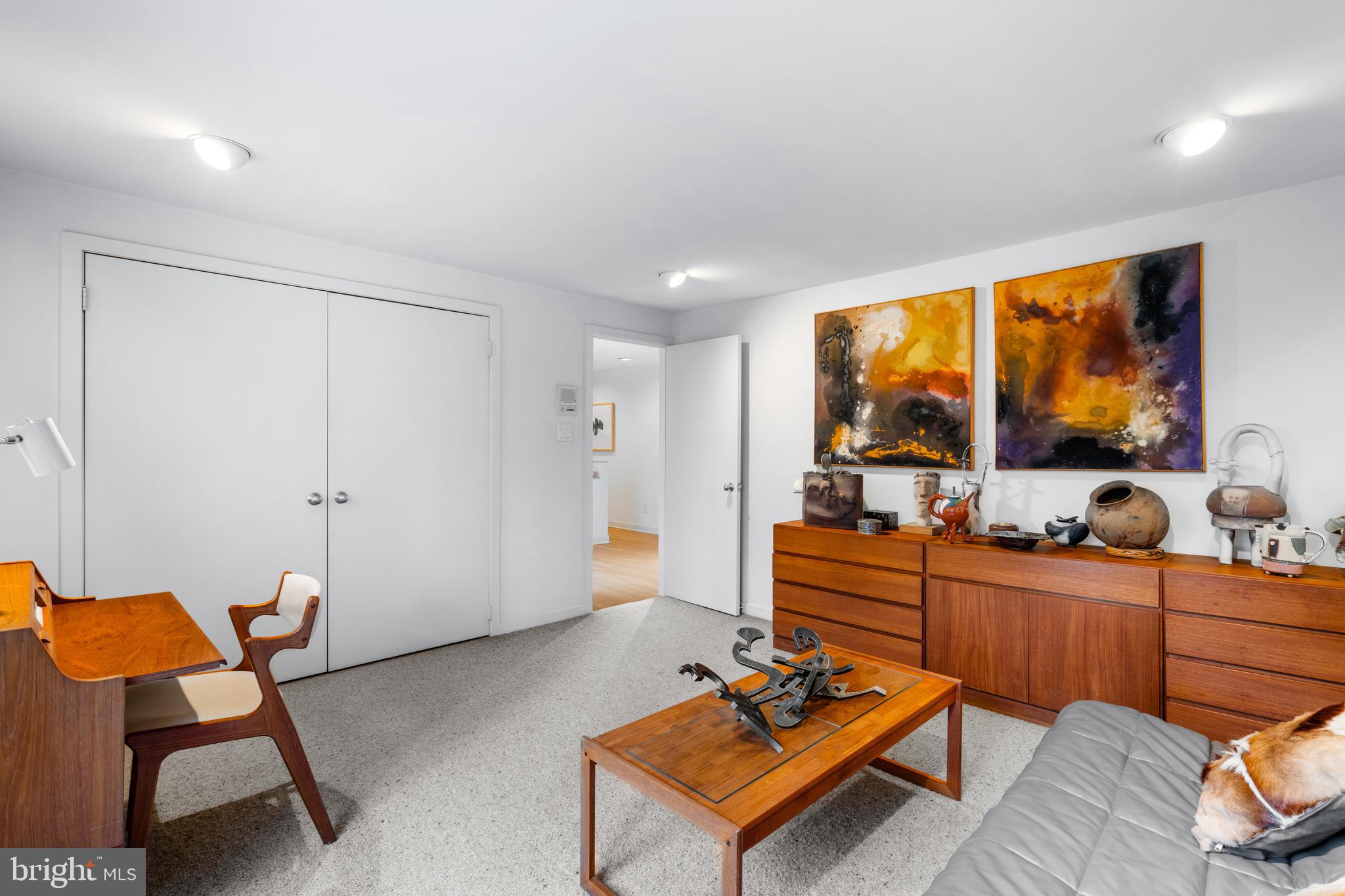 1041 Waverly Road Gladwyne, PA 19035 - Photo 29 of 39 a living room with furniture and a flat screen tv