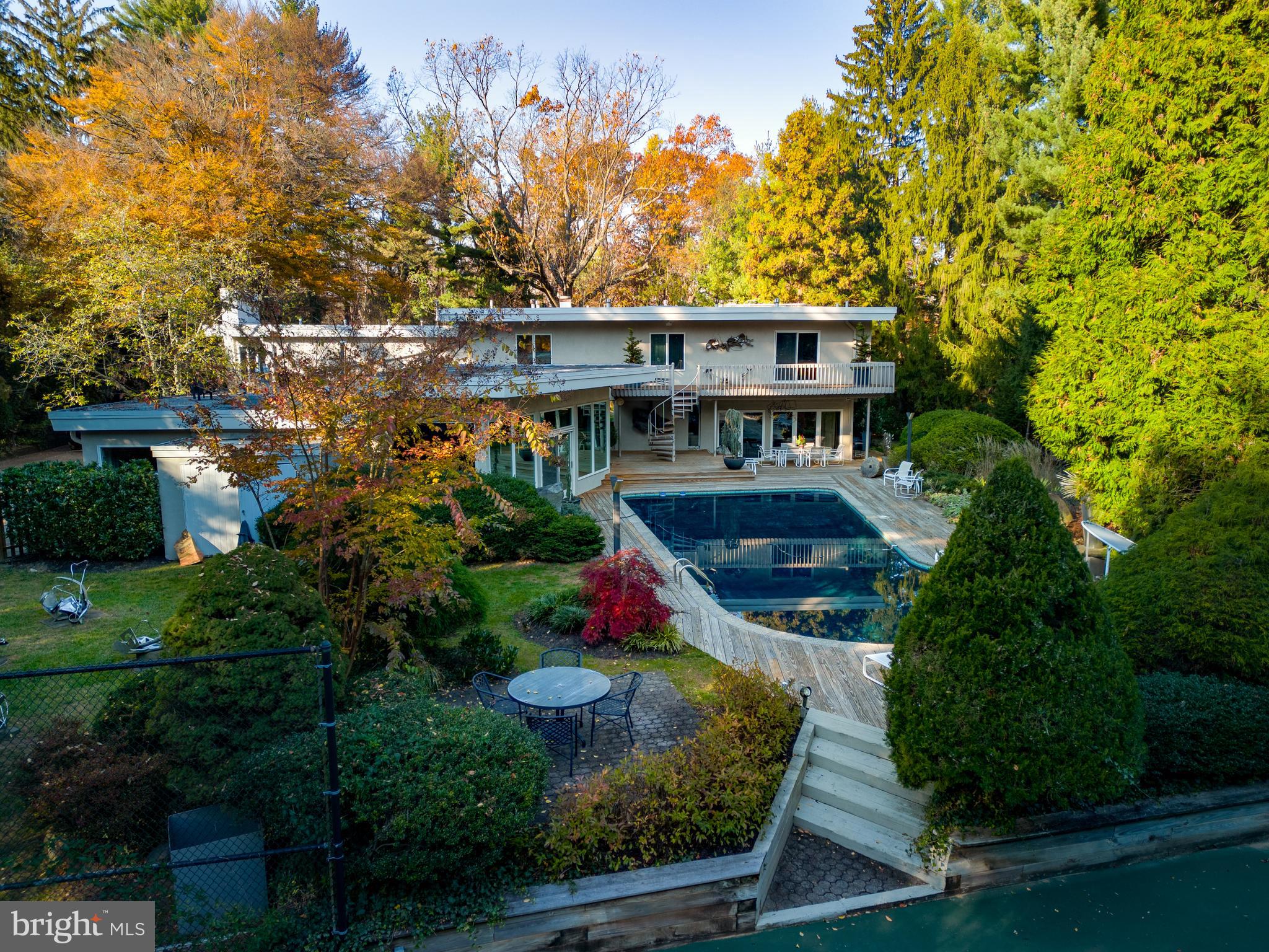 1041 Waverly Road Gladwyne, PA 19035 - Photo 3 of 39 aerial view of a house with swimming pool and garden