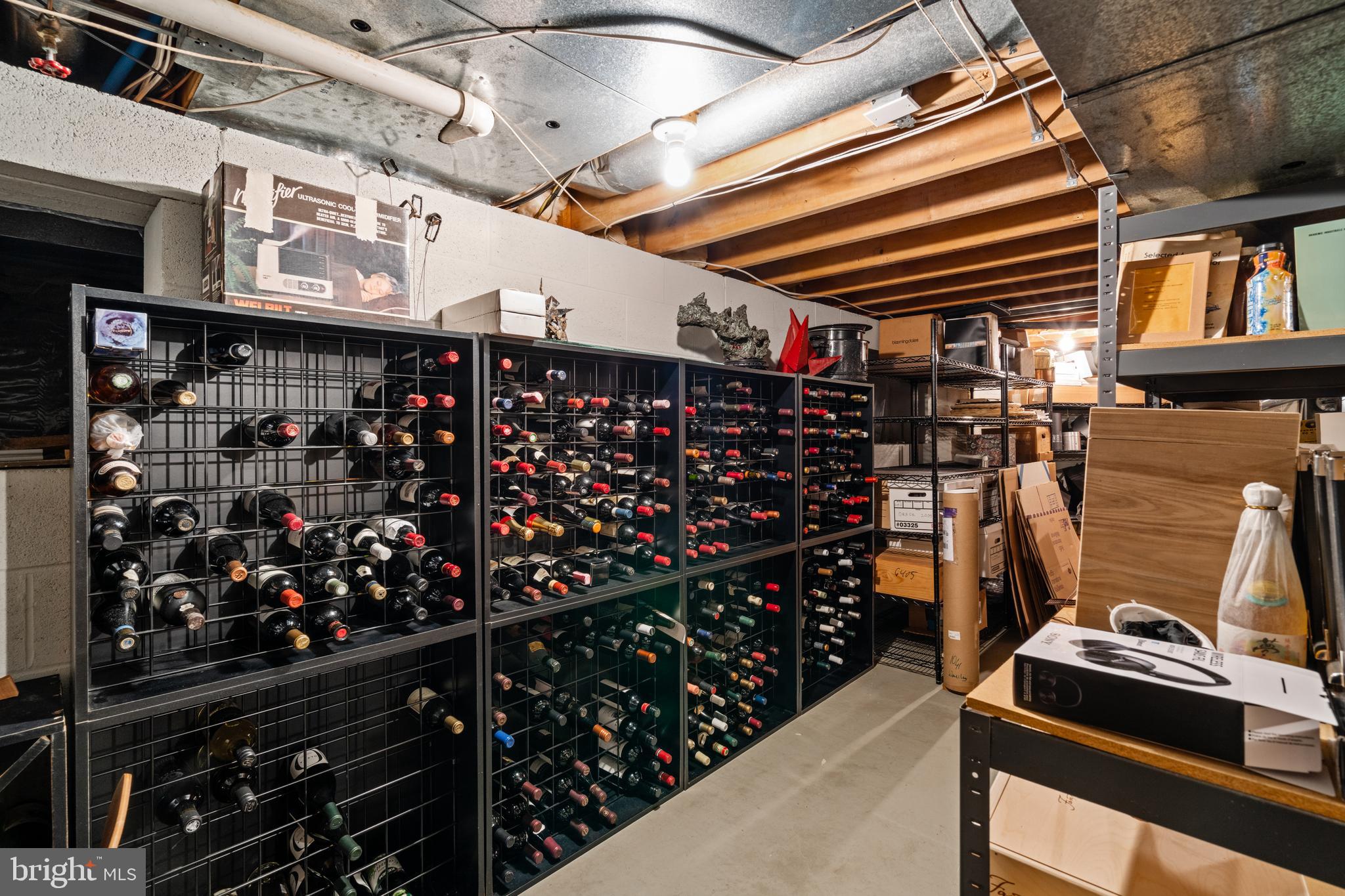 1041 Waverly Road Gladwyne, PA 19035 - Photo 33 of 39 a store room with lots of different colored cloths