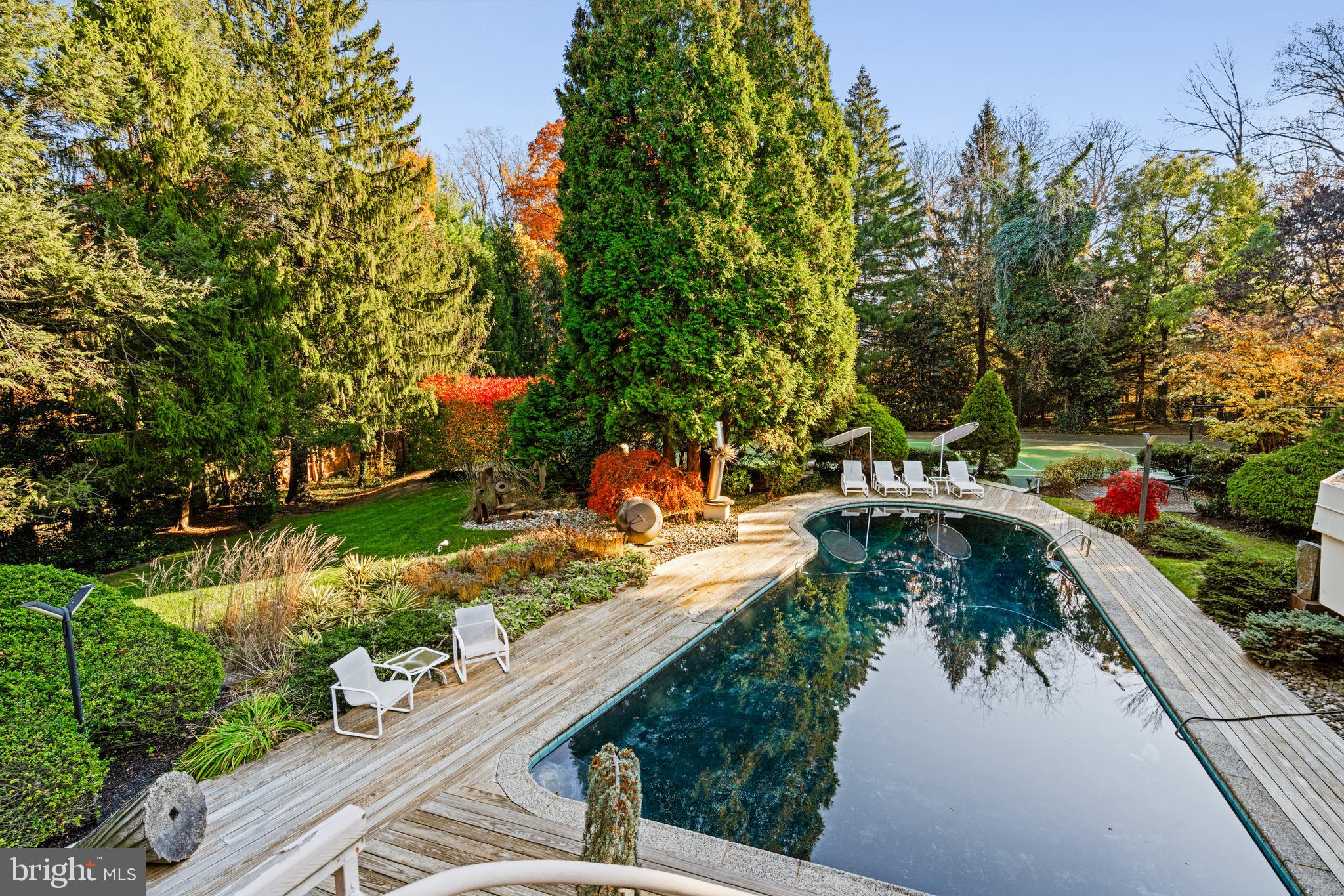 1041 Waverly Road Gladwyne, PA 19035 - Photo 36 of 39 a view of a lake with a house