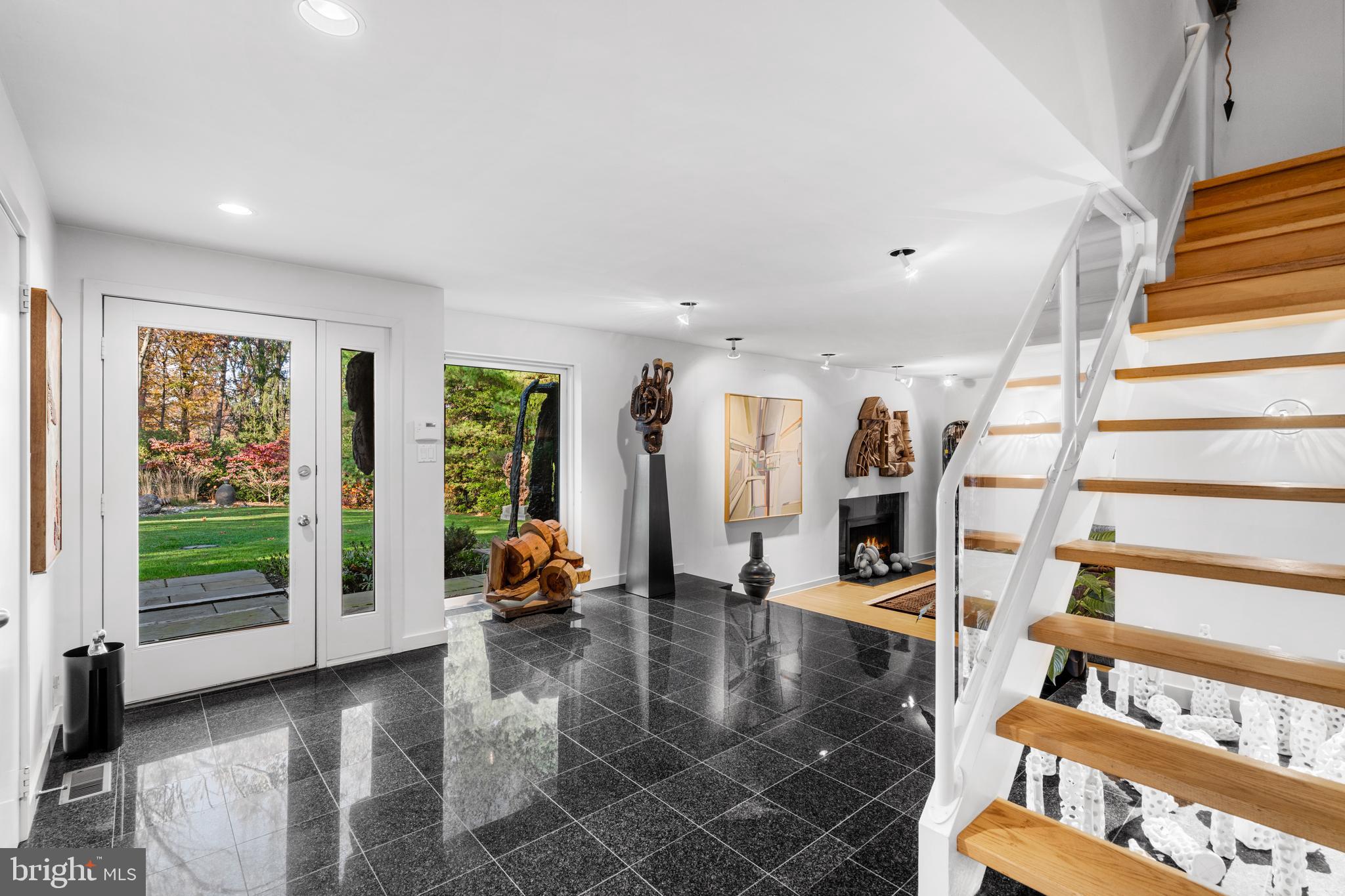 1041 Waverly Road Gladwyne, PA 19035 - Photo 4 of 39 a view of an entryway with wooden floor and windows