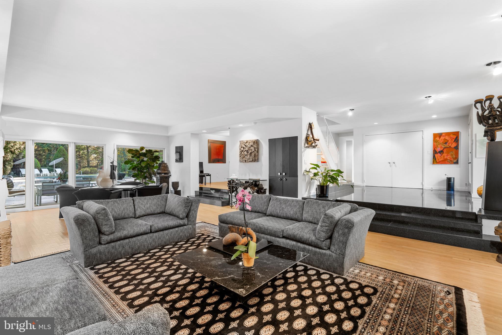 1041 Waverly Road Gladwyne, PA 19035 - Photo 6 of 39 a living room with furniture and a couch