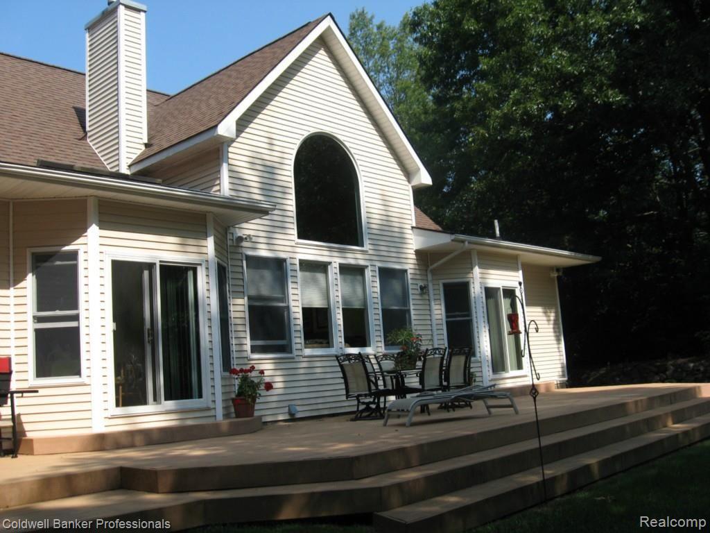 3917 Hosner Road Dryden, MI 48428 - Photo 8 of 43 Rear view of home with window to great room