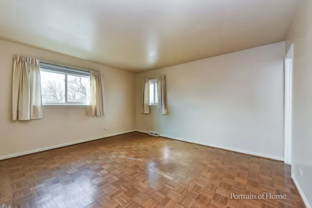 an empty room with windows