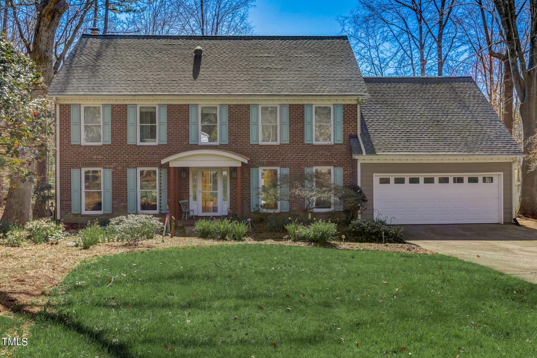 11601 Rutledge Bay Road Raleigh, NC 27614 - Photo 2 of 59 a front view of a house with garden