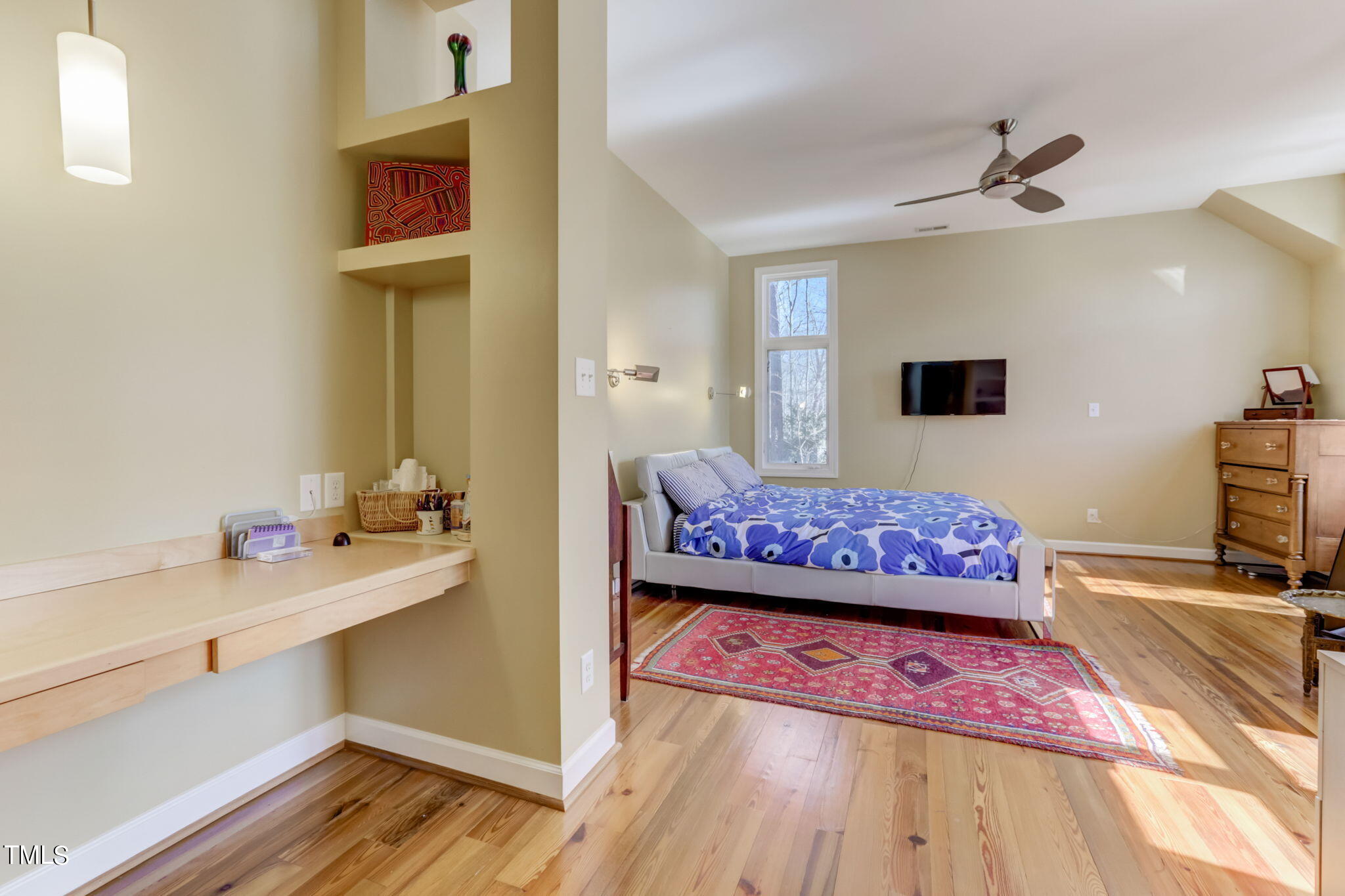 11601 Rutledge Bay Road Raleigh, NC 27614 - Photo 21 of 59 a bedroom with a bed and a flat screen tv