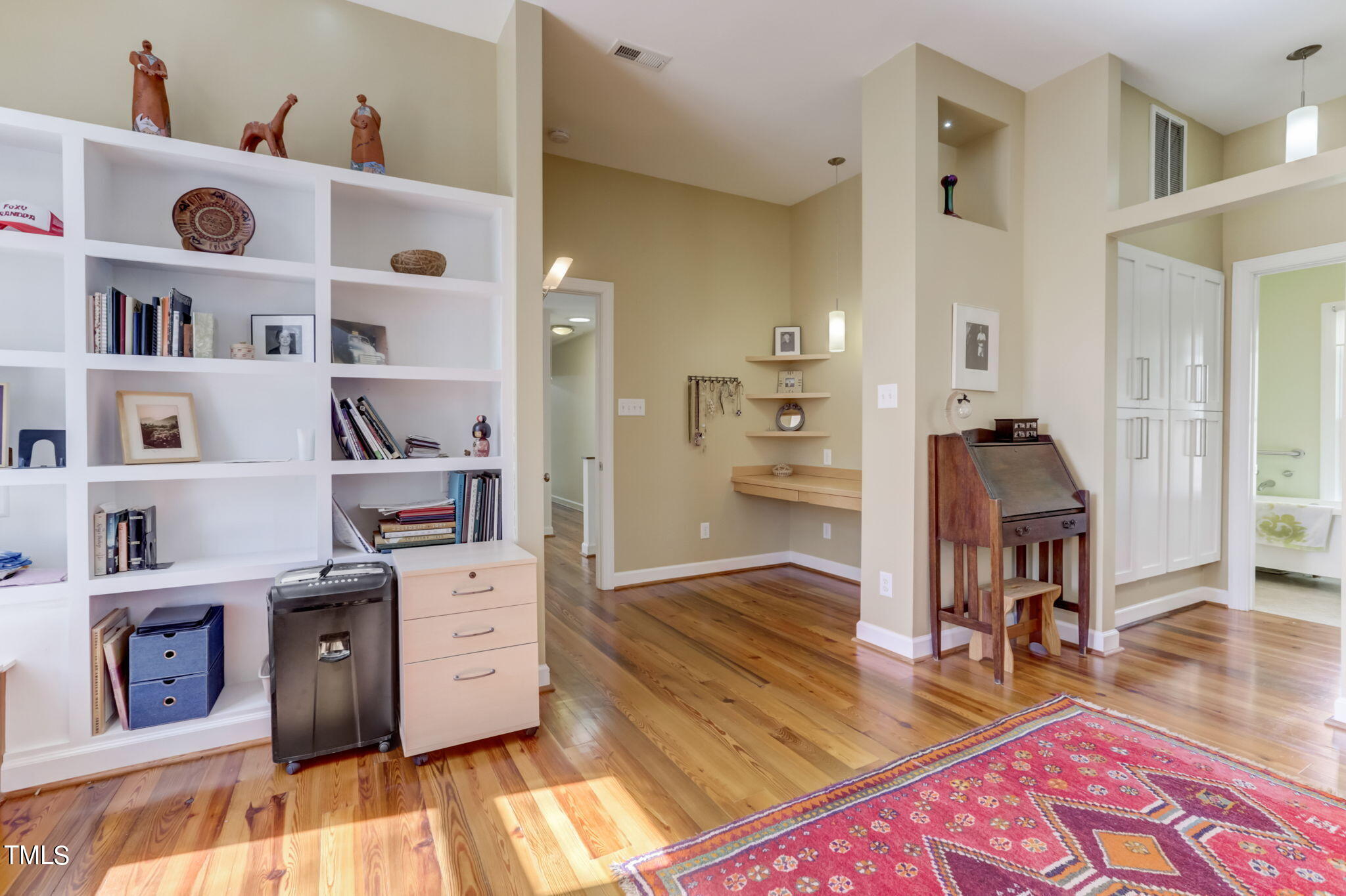 11601 Rutledge Bay Road Raleigh, NC 27614 - Photo 23 of 59 a living room with furniture and a wooden floor
