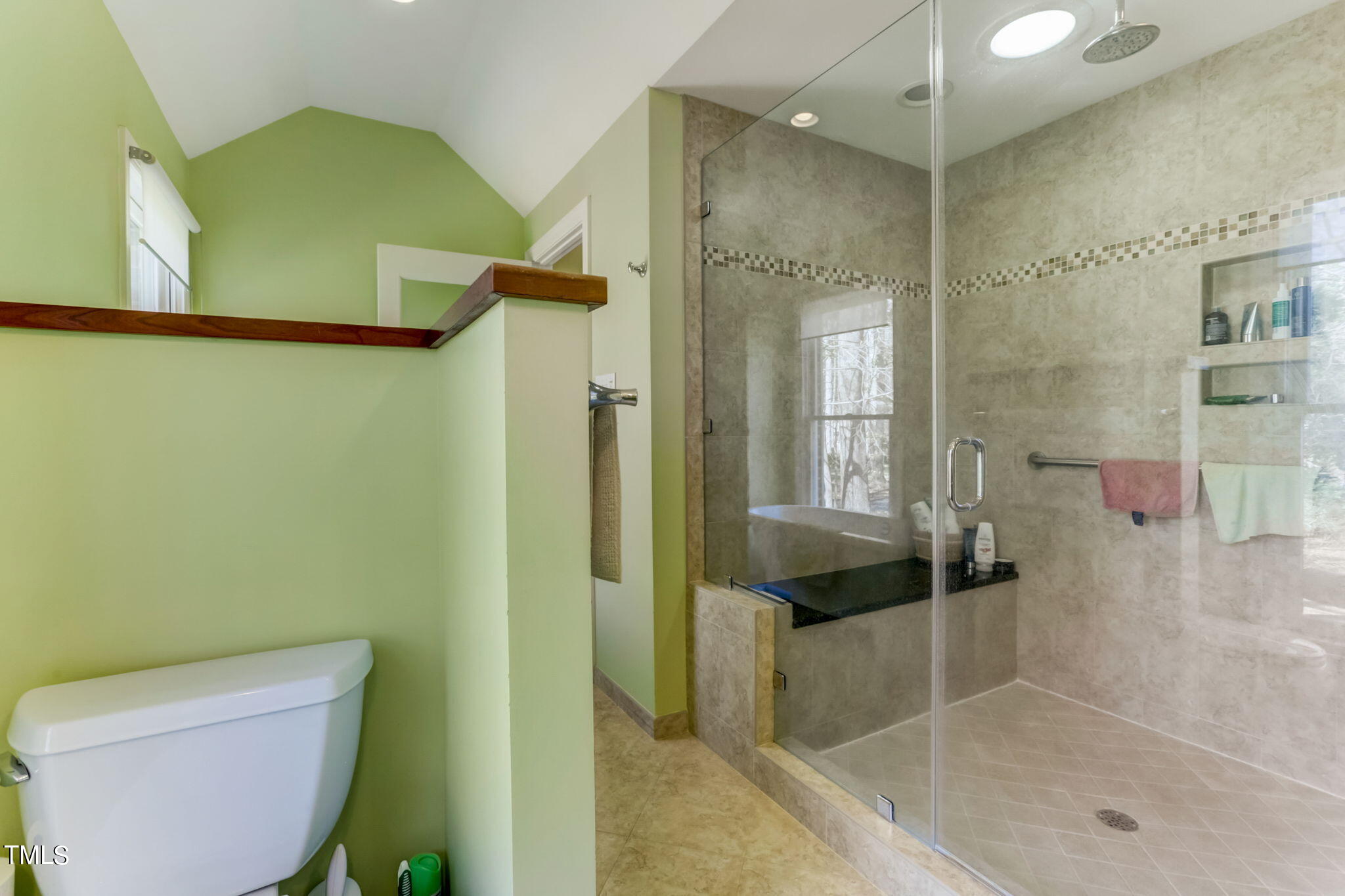 11601 Rutledge Bay Road Raleigh, NC 27614 - Photo 27 of 59 a bathroom with a shower and toilet