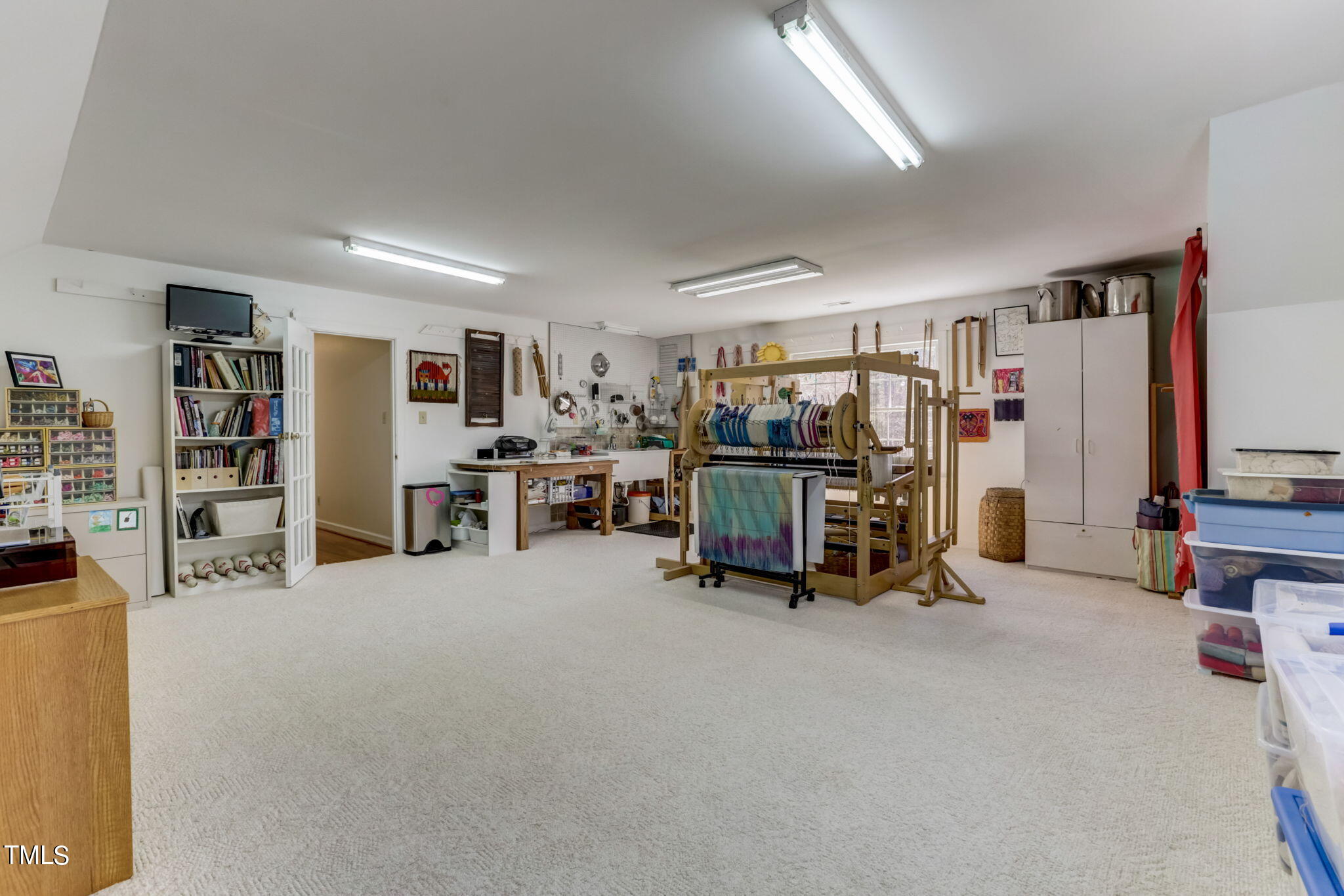 11601 Rutledge Bay Road Raleigh, NC 27614 - Photo 35 of 59 a view of a room with furniture window and a ceiling fan