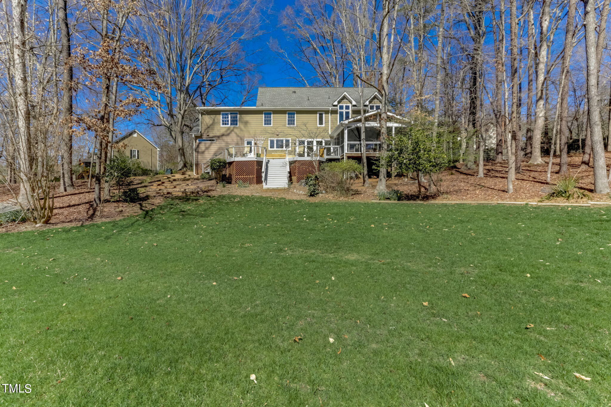 11601 Rutledge Bay Road Raleigh, NC 27614 - Photo 45 of 59 a view of a building with a yard