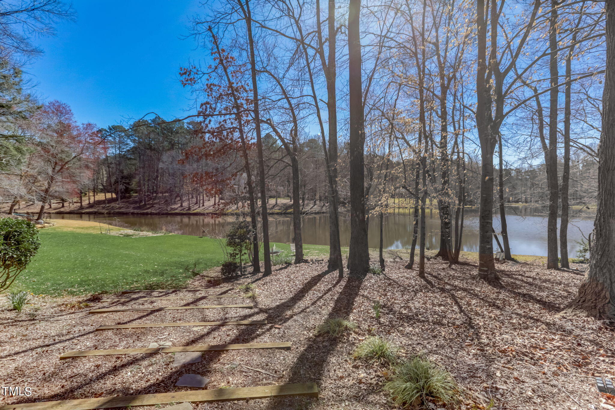 11601 Rutledge Bay Road Raleigh, NC 27614 - Photo 49 of 59 a backyard of a house with lots of green space