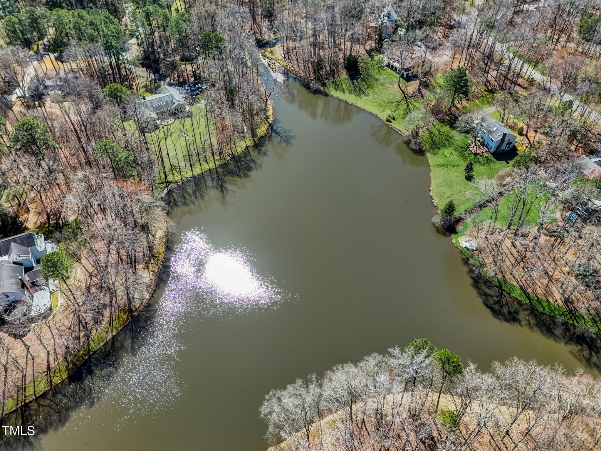 11601 Rutledge Bay Road Raleigh, NC 27614 - Photo 54 of 59 a view of lake from inside of house