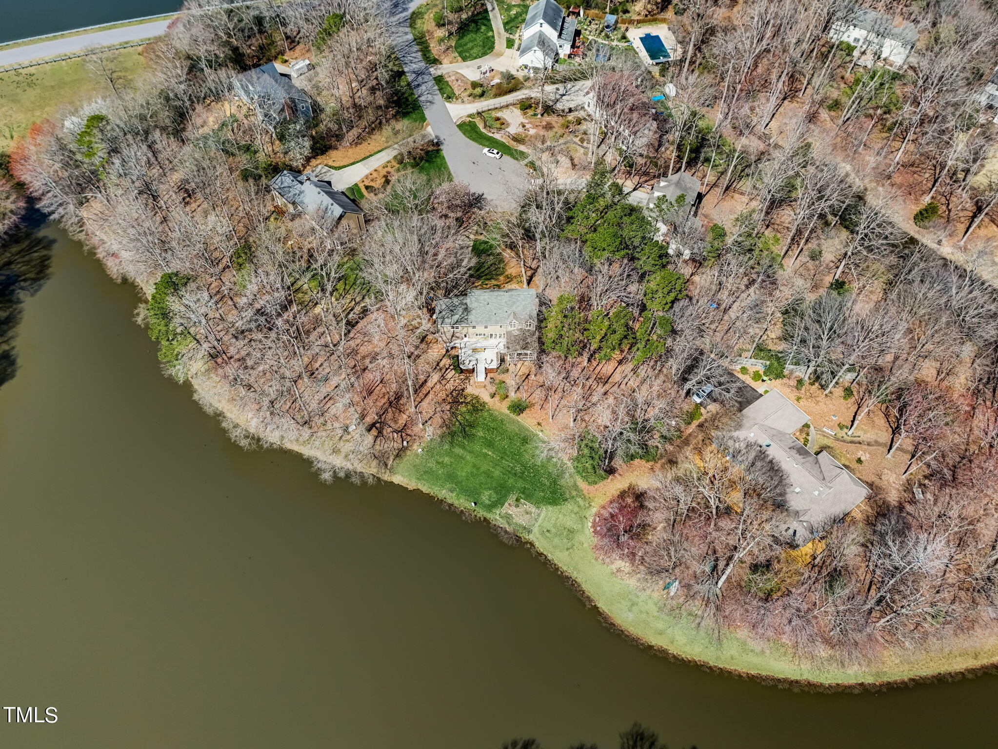 11601 Rutledge Bay Road Raleigh, NC 27614 - Photo 56 of 59 an aerial view of a house with a yard and lake view