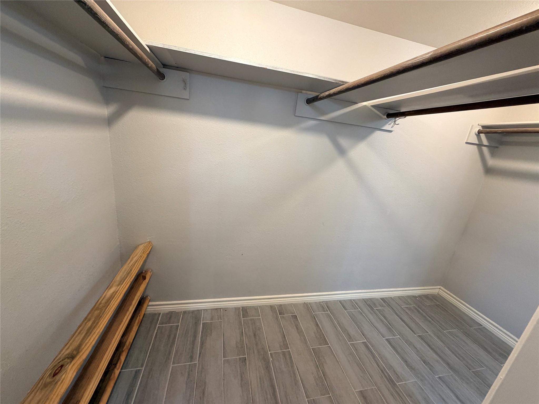 1607 Chestnut Ridge Road Houston, TX 77339 - Photo 23 of 31 a view of a room with wooden floor