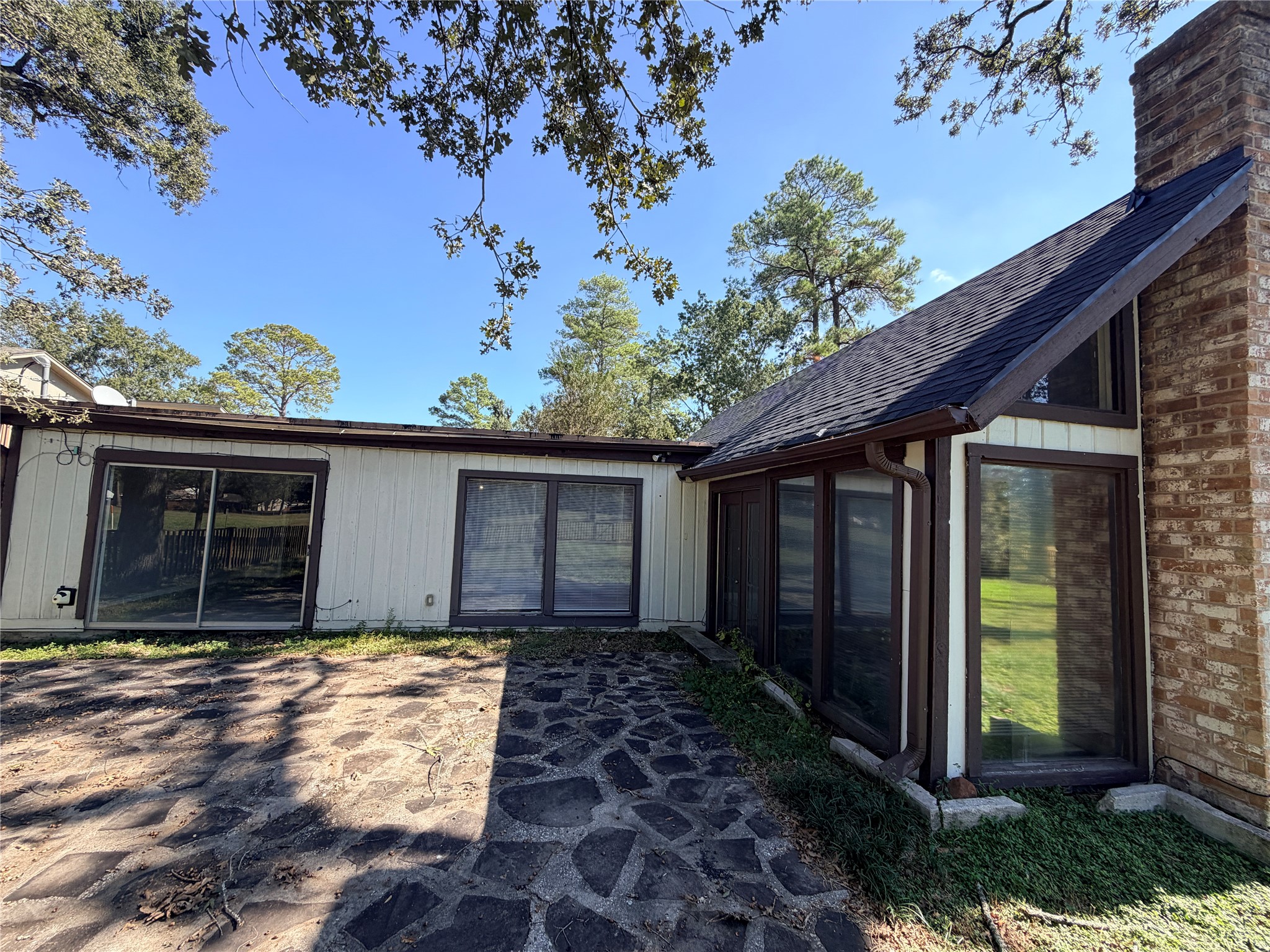1607 Chestnut Ridge Road Houston, TX 77339 - Photo 28 of 31 a front view of a house with a yard