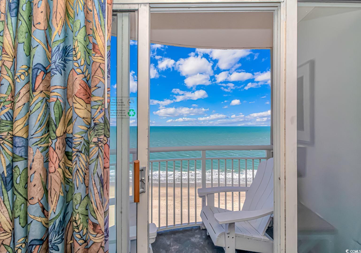 1708 North Ocean Boulevard, Unit PH1 Myrtle Beach, SC 29577 - Photo 7 of 26 Balcony featuring view of water and beach