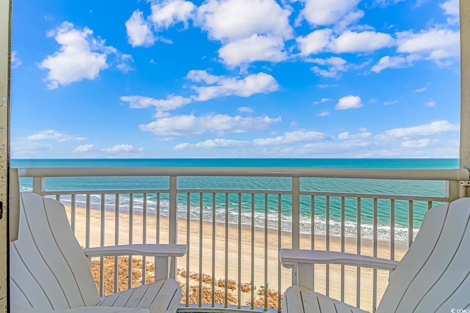 1708 North Ocean Boulevard, Unit PH1 Myrtle Beach, SC 29577 - Photo 8 of 26 Balcony featuring view of water and beach