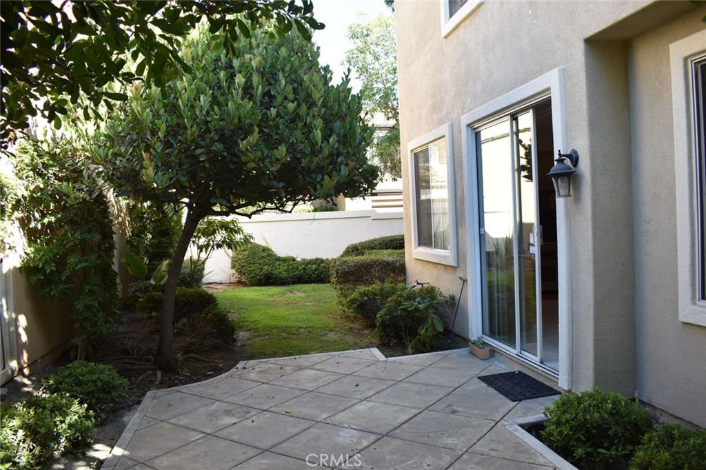 16 Del Ventura Irvine, CA 92606 - Photo 14 of 15 a front view of a house with a yard