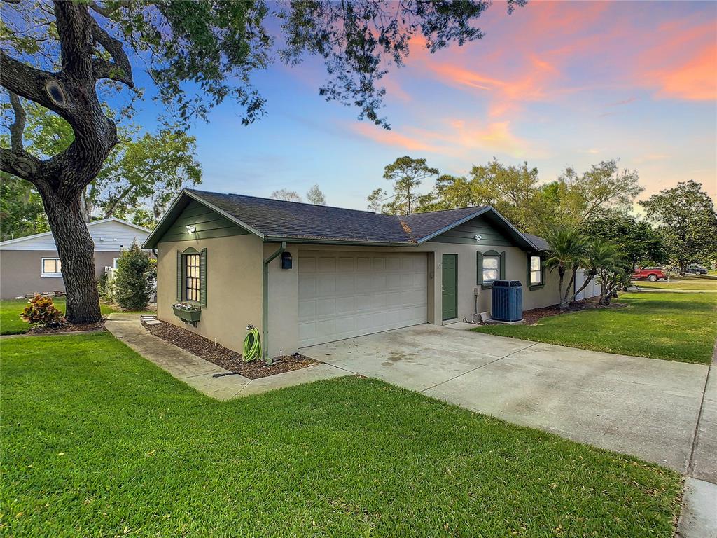 100 Quail Ridge Court Sanford, FL 32771 - Photo 1 of 1 a front view of house with yard and green space